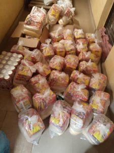 CMN Charity July 2025 CMN Charity volunteers handing out food bags to thankful families during the July 2025 community distribution event.