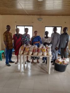 CMN Charity July 2025 CMN Charity volunteers handing out food bags to thankful families during the July 2025 community distribution event.