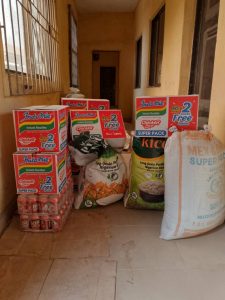 CMN Charity July 2025 CMN Charity volunteers handing out food bags to thankful families during the July 2025 community distribution event.
