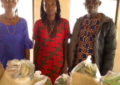 CMN Charity volunteers distributing food packages to grateful families during the December 2025 holiday food drive, spreading hope and compassion.
